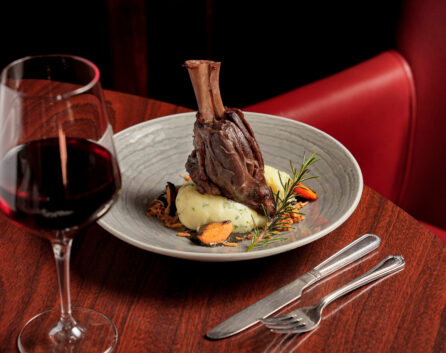 Elegant dining with lamb shank and wine at River Island Hotel, Kerry.