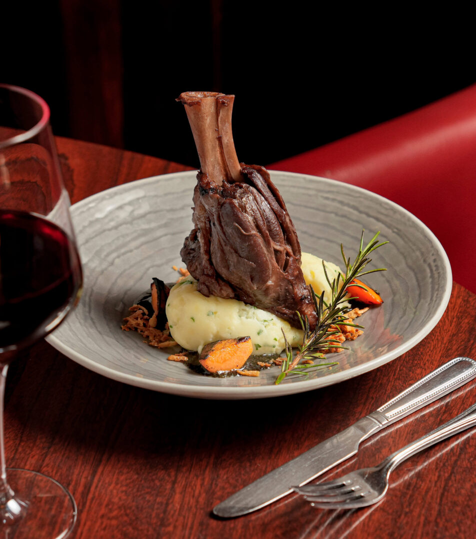 Elegant dining with lamb shank and wine at River Island Hotel, Kerry.