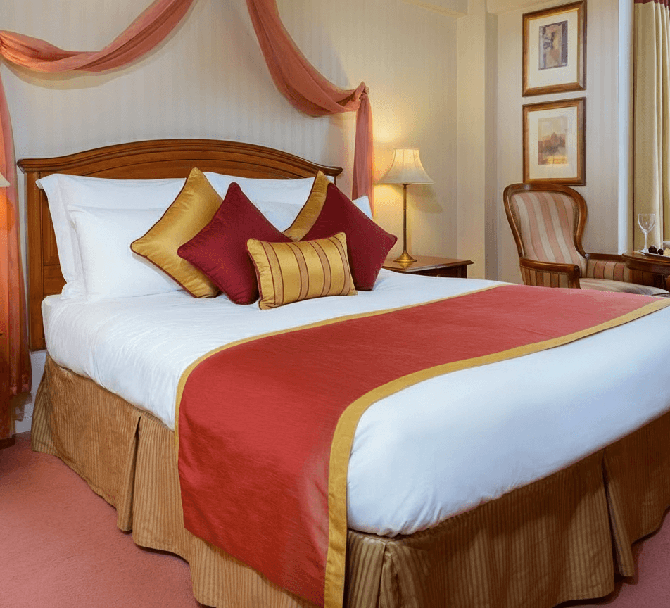 Cosy hotel room with a large bed and vibrant decor at River Island Hotel, Kerry.