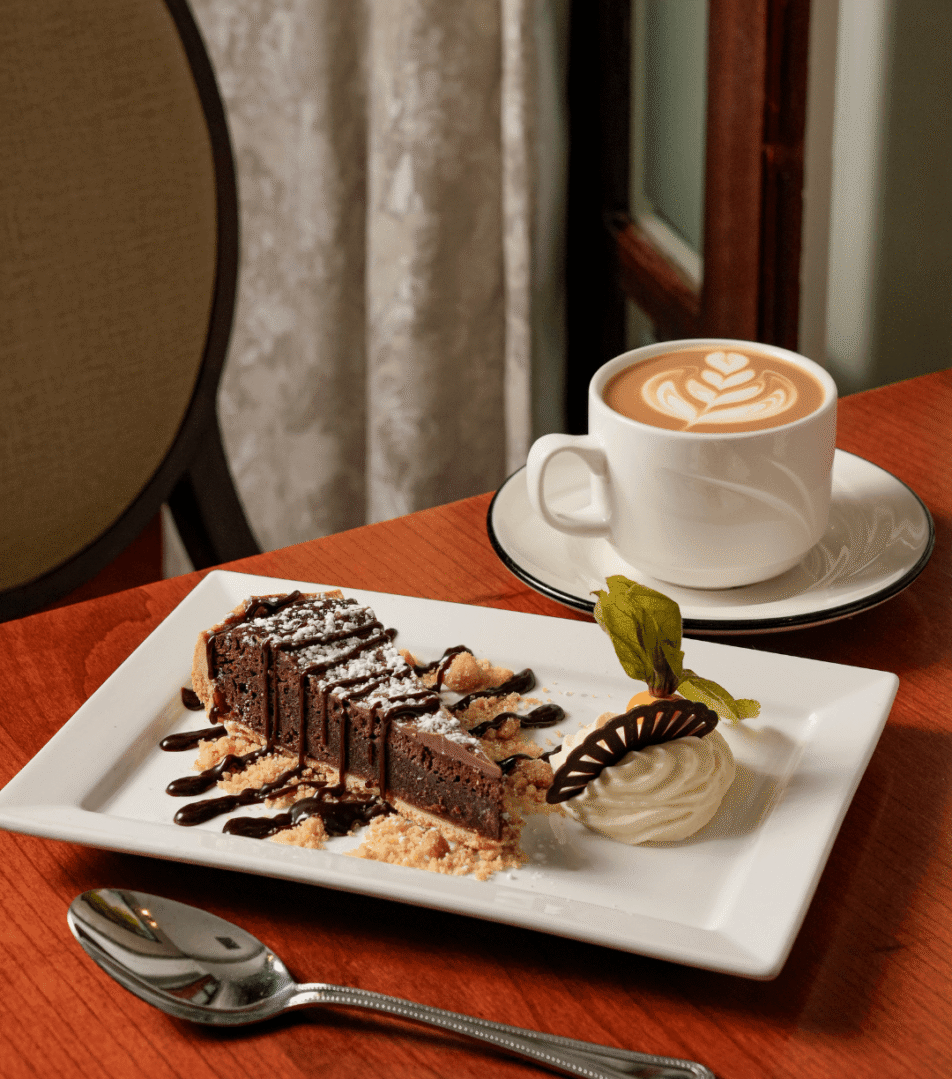 Chocolate dessert with cappuccino at River Island Hotel.