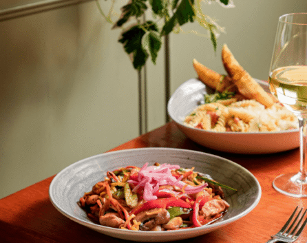 Delicious plated meals and wine in a cosy River Island Hotel restaurant setting.