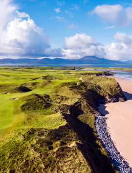 Family enjoying a beach walk along the coast near River Island Hotel, Kerry.