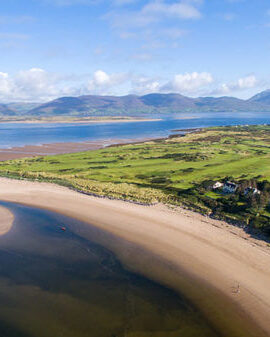 Aerial view of scenic beach near River Island Hotel, ideal for family exploring and touring.