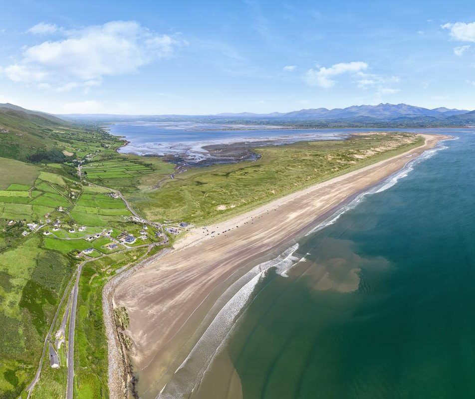 Scenic aerial view of beach and coastline near River Island Hotel, ideal for family excursions.