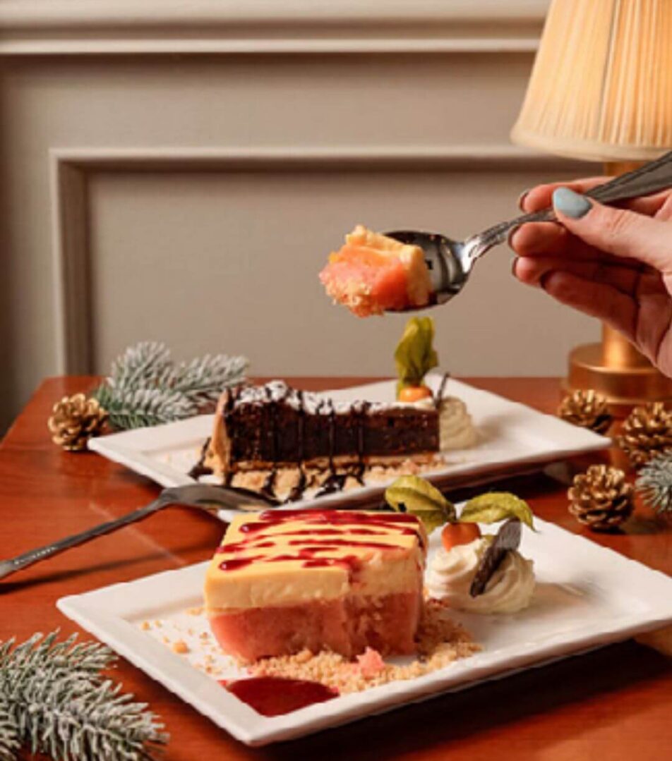 Dessert plates with cheesecake and chocolate tart at River Island Hotel, Kerry.