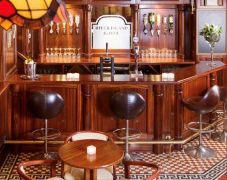 Elegant bar area in River Island Hotel with cosy seating and warm lighting.
