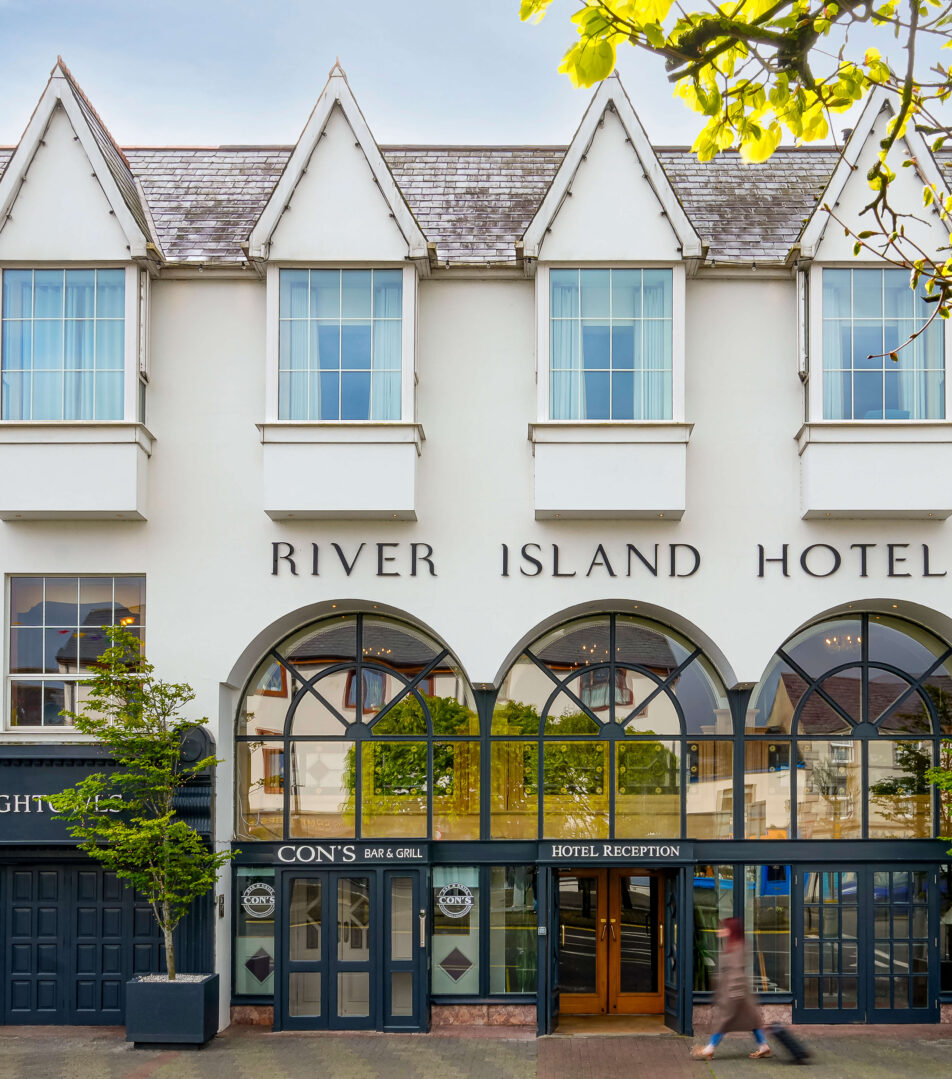 Guests entering River Island Hotel, a cosy 3-star accommodation near Kerry airport.